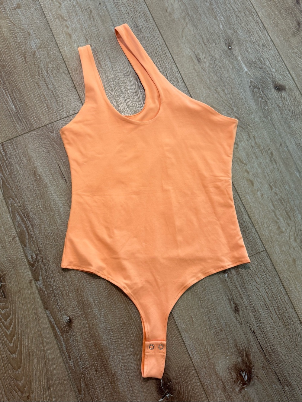 Amazon Women's Sleeveless Bodysuit in Peach Orange